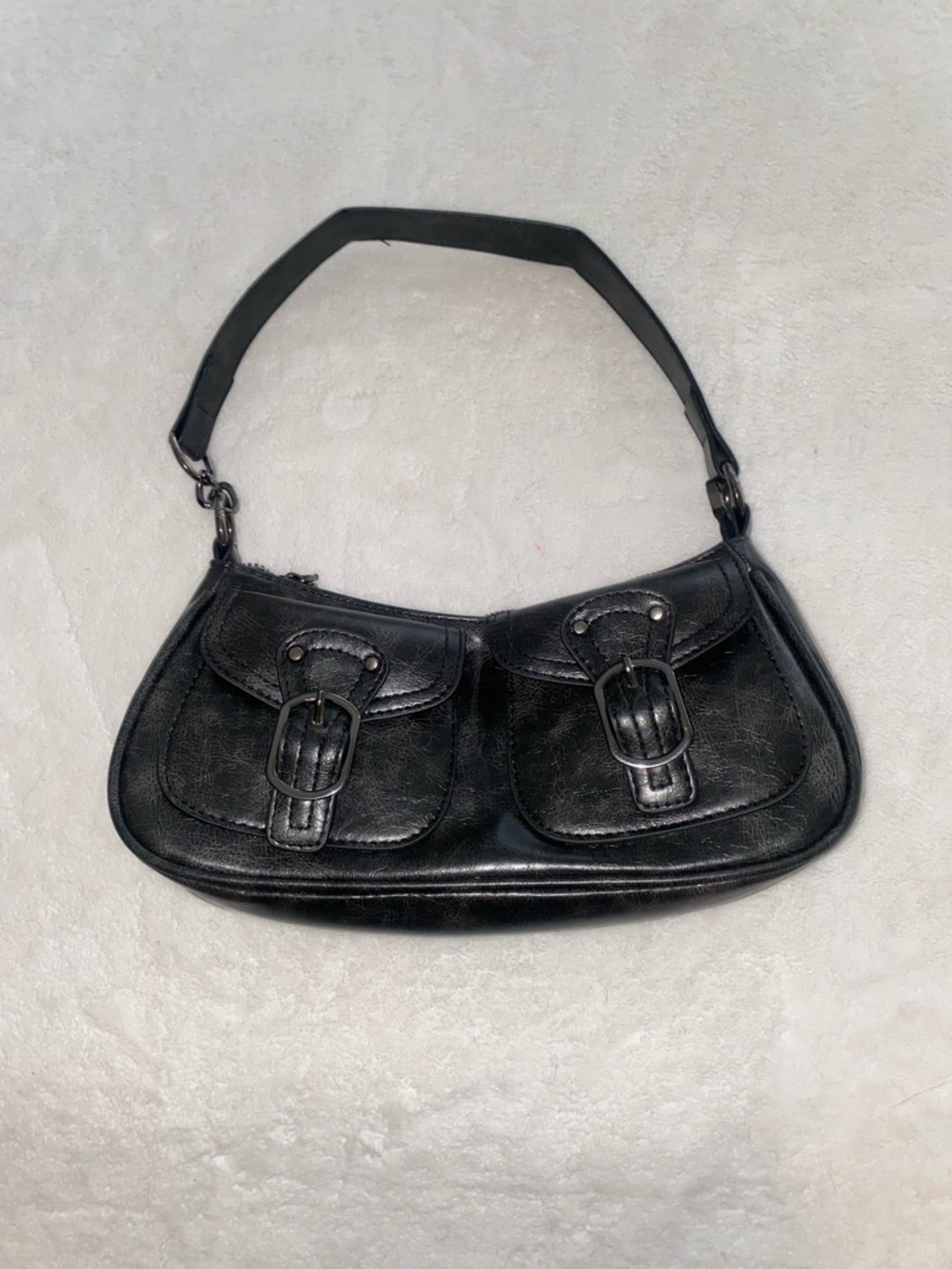 Sleek Black Leather Shoulder Bag with Double Buckle Pockets